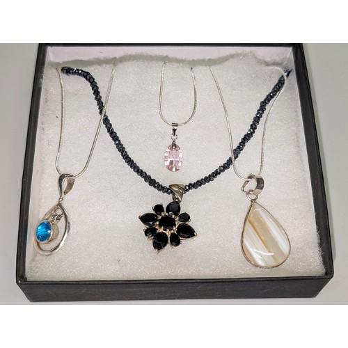 465 - Bundle of 4 x assorted 925 stamped silver pendant necklaces
