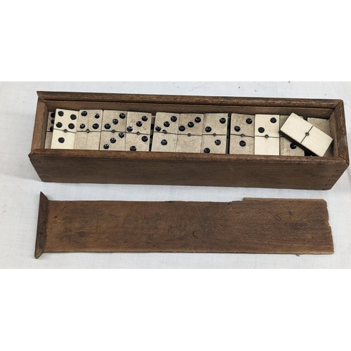 421 - Vintage set of bone and ebony double 9 dominoes, complete set in wooden case