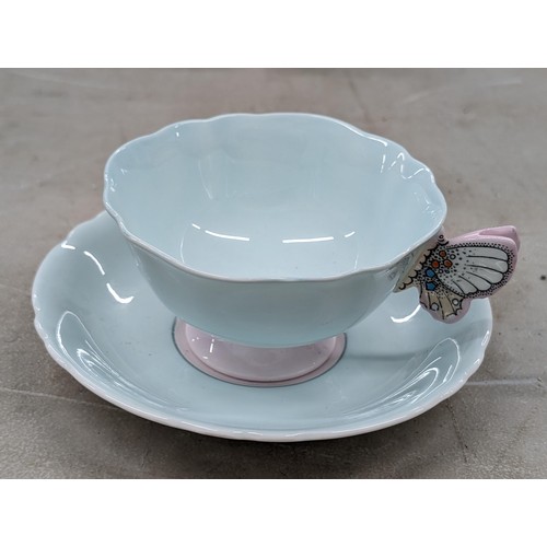 180 - Rare 1940's vintage Paragon bone china cup and saucer - cup having butterfly handle