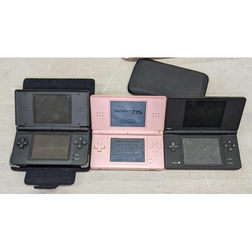 21 - 2 x Nintendo DS Lite hand held consoles (pink one with some charge and working) and other Nintendo D... 