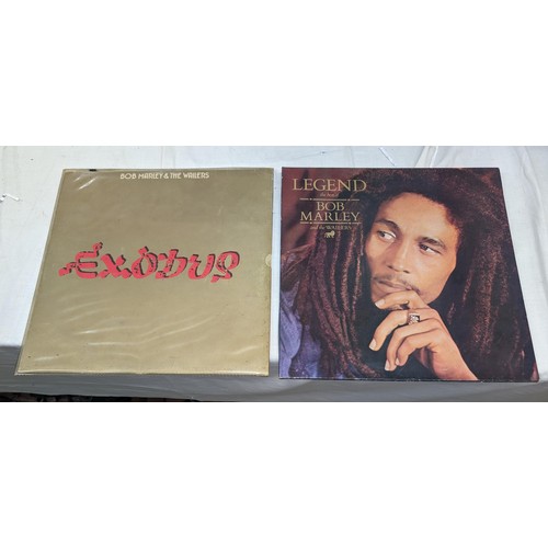 424 - 2 x Bob Marley vinyl albums in average condition, John Lennon -Imagine in good condition and the Bea... 