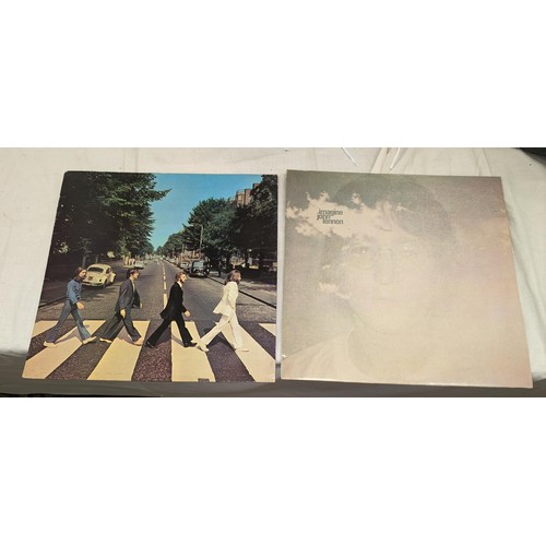 424 - 2 x Bob Marley vinyl albums in average condition, John Lennon -Imagine in good condition and the Bea... 
