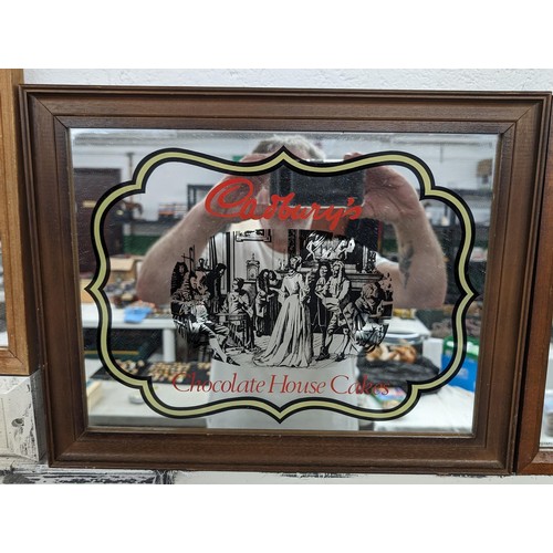 325 - 43 x 34 cm framed Cadburys and 3 x other smaller vintage picture mirrors