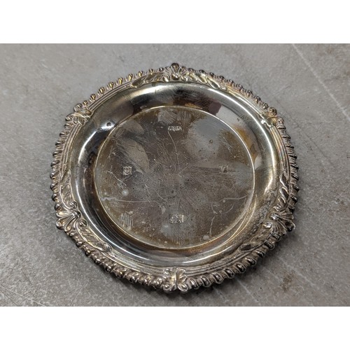 198 - 1970 Birmingham hallmarked silver ornate rimmed dish in very good condition - 40.4 gm