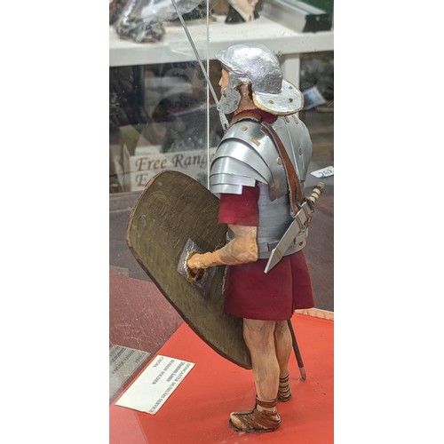 191 - Model of a Roman soldier in 32 x 29 x 39 cm perspex case - was displayed in Doncaster museum