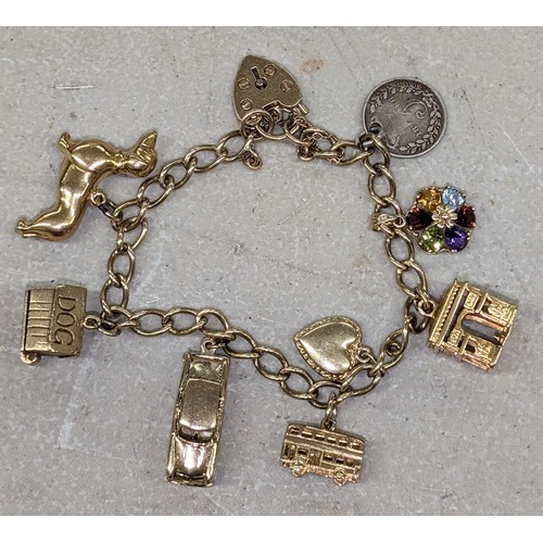 446 - 9 carat gold charm bracelet with padlock and 7 x 9 carat gold charms plus 1886 silver threepence - 3... 