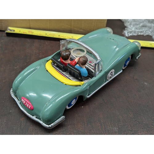 170 - Vintage tin plate racing car with box