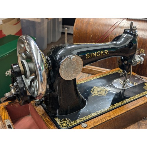 201 - 1907 Singer 15k hand crank sewing machine in bentwood case, good condition and moves freely