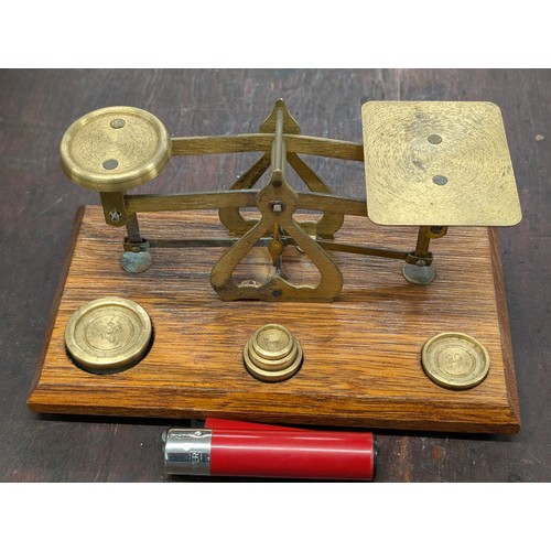 28 - Small vintage brass letter balance with weights