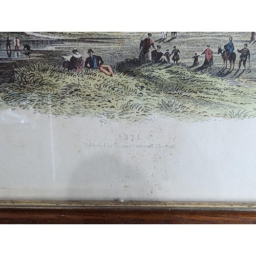 175 - Pair of 21.5 x 16.5 cm framed and hand coloured 19th century Rhyl etchings