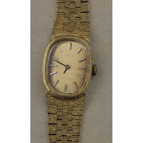 427 - Vintage Tissot Stylist ladies gold tone watch with extra links
