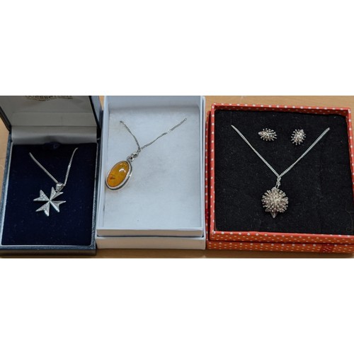 140 - 3 x silver pendant necklaces including 1 with matching earrings