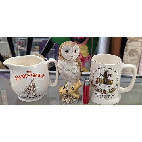 90 - Breweriana trio of Wade Famous Grouse water jug, Royal Doulton Whyte & Mackay barn owl decanter (wit... 
