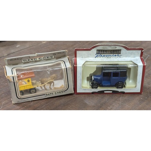 40 - 2 x boxed and near mint days gone vehicles being 1933 Austin taxi & Windmill Bakery delivery horse a... 