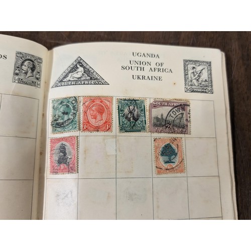 62 - 2 x vintage stamp albums with some stamps and box of loose stamps
