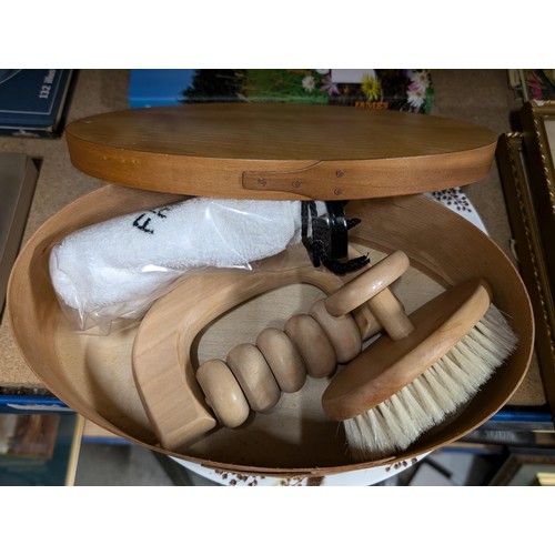 65 - As new massager, brush and flannel set in oval bentwood case