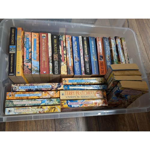 170 - Plastic lidded storage box with collection of 30 x Terry Pratchett discworld books - all proceeds fr... 