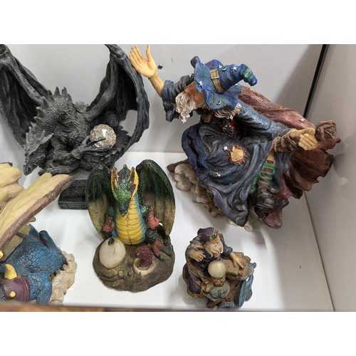 86 - Collection of assorted mythical dragon and wizard figures in Dragon Chronicles box