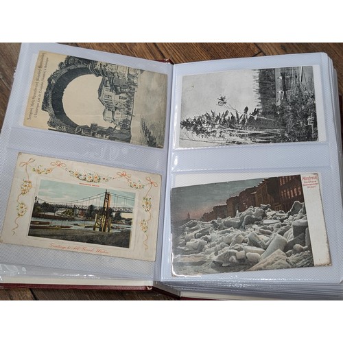 117 - Album with 198 assorted early 1900's onwards vintage postcards including rare Zeppelin, steam trains... 