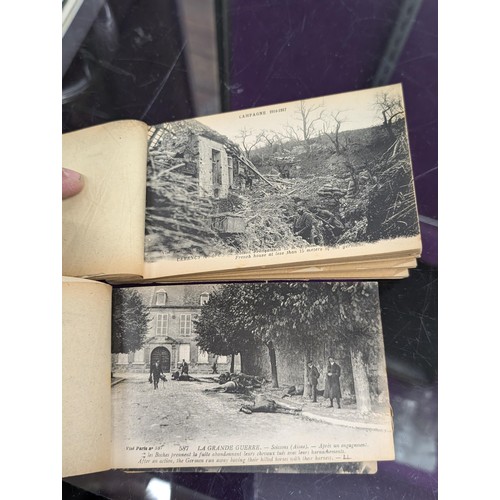 29 - 2 x WWI unused postcard booklets being En Artois (24) and Bataille De L'Aisne (20) with bombed scene... 