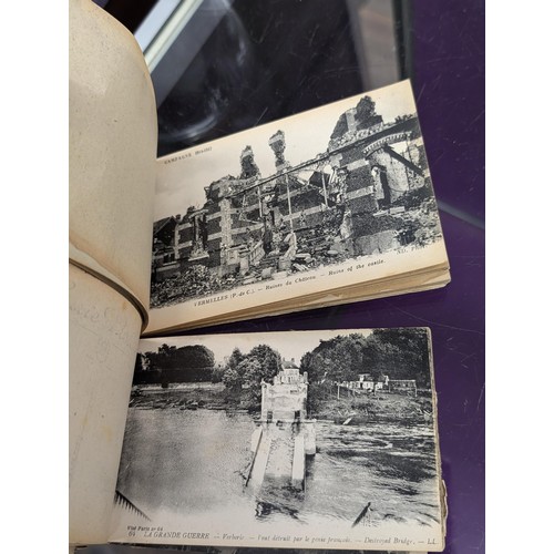 29 - 2 x WWI unused postcard booklets being En Artois (24) and Bataille De L'Aisne (20) with bombed scene... 