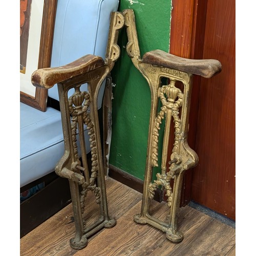 308 - Pair of early 1900's cast cinema/theatre seating ends, numbered 1-32 - believed to have been from th... 