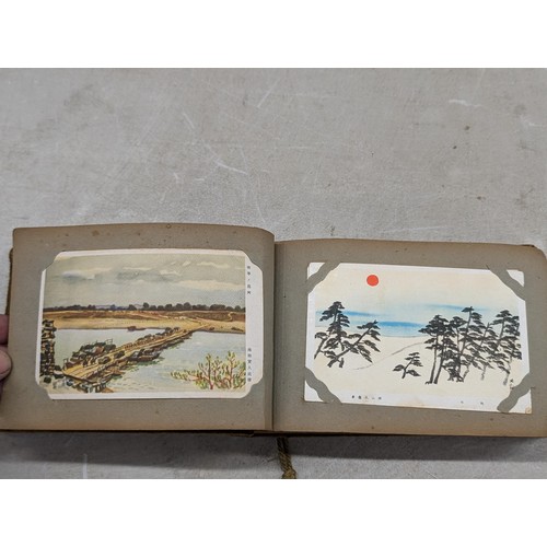 37 - 1940's Japanese postcard album full of mostly unwritten postcards - some written and posted with Jap... 