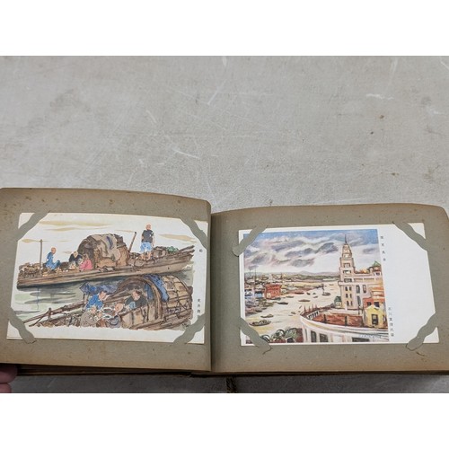 37 - 1940's Japanese postcard album full of mostly unwritten postcards - some written and posted with Jap... 