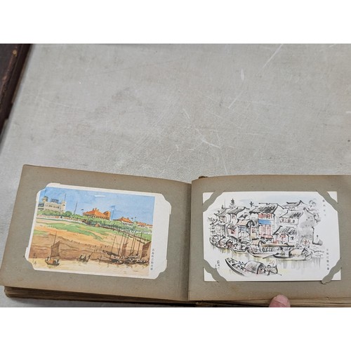 37 - 1940's Japanese postcard album full of mostly unwritten postcards - some written and posted with Jap... 