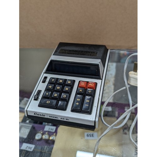 60 - Vintage Casio model AS-8A desk top electronic calculator. Powers but screen not showing digits