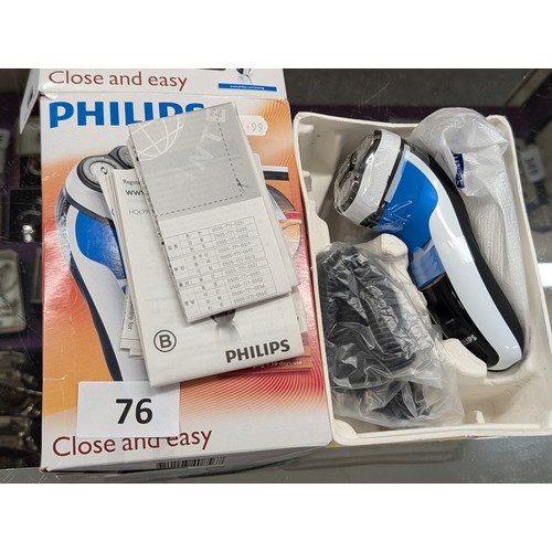 76 - Boxed and apparently unused Philips close and easy rechargeable shaver