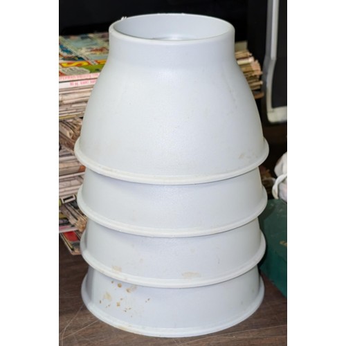 197 - Set of 4 x Gordon Ellis & Co 'Elephant foot' hard plastic chair raisers