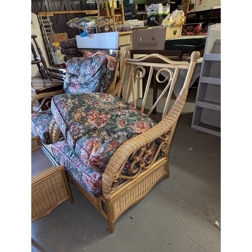 528 - Vintage good quality cane and rattan pair of conservatory chairs with cushions and matching side tab... 