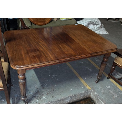 636 - 19th century mahogany extending dining table with extra leaf and winder and set of 8 highly carved h... 