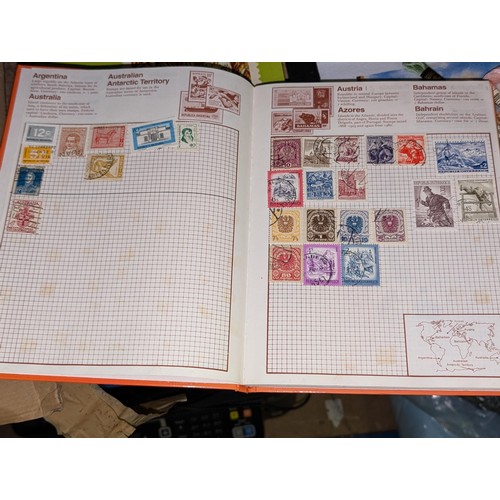 138 - Kaleidoscope stamp album with stamps