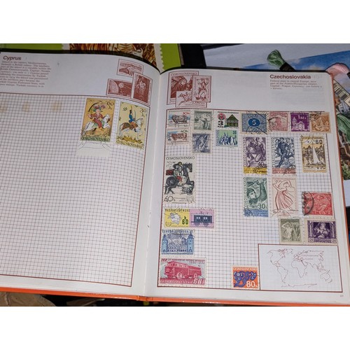 138 - Kaleidoscope stamp album with stamps