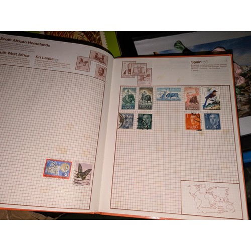 138 - Kaleidoscope stamp album with stamps