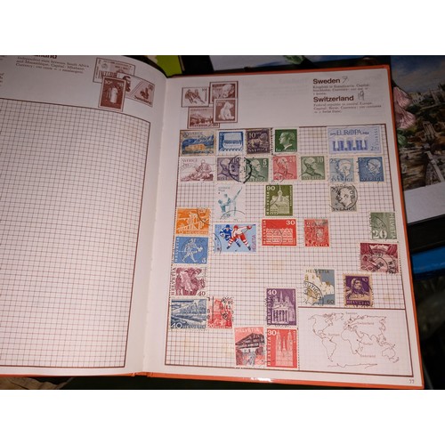 138 - Kaleidoscope stamp album with stamps