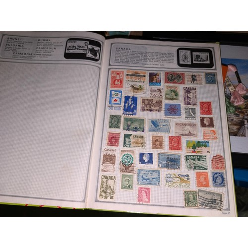 139 - Safari stamp album with stamps