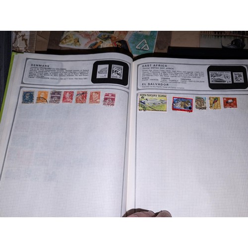 139 - Safari stamp album with stamps