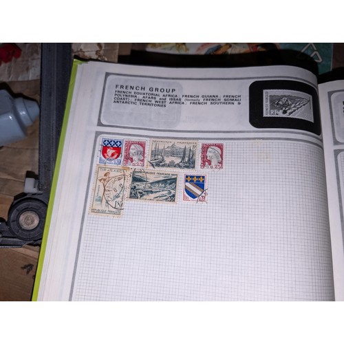 139 - Safari stamp album with stamps