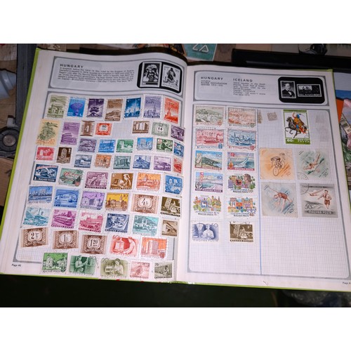 139 - Safari stamp album with stamps