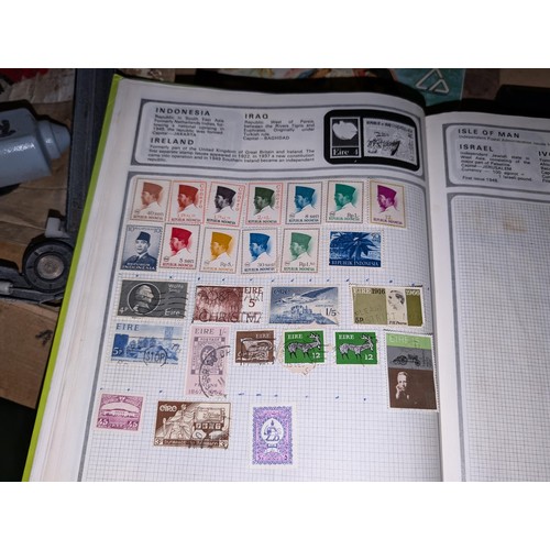 139 - Safari stamp album with stamps