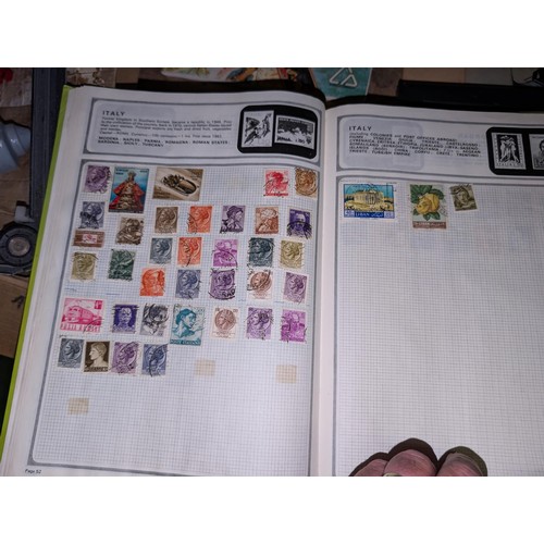 139 - Safari stamp album with stamps