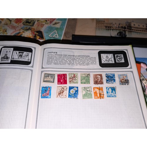 139 - Safari stamp album with stamps