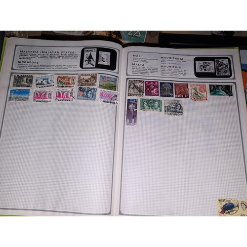 139 - Safari stamp album with stamps