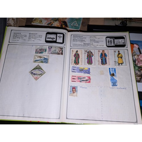 139 - Safari stamp album with stamps