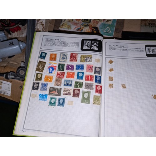 139 - Safari stamp album with stamps