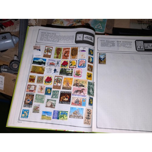 139 - Safari stamp album with stamps