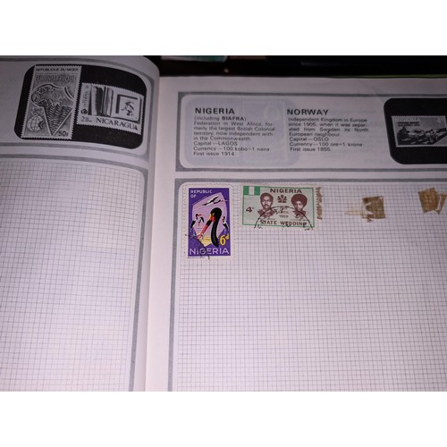 139 - Safari stamp album with stamps